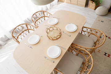 Beautiful table setting for dinner in dining room