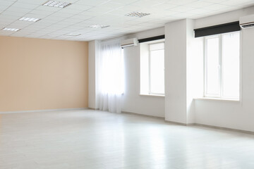 Light curtain and beige wall in empty room