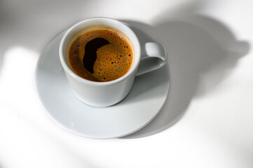 Close-up of coffee cup on table
