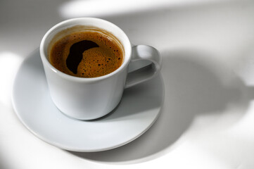 Cup of Greek - Turkish coffee isolated on white background