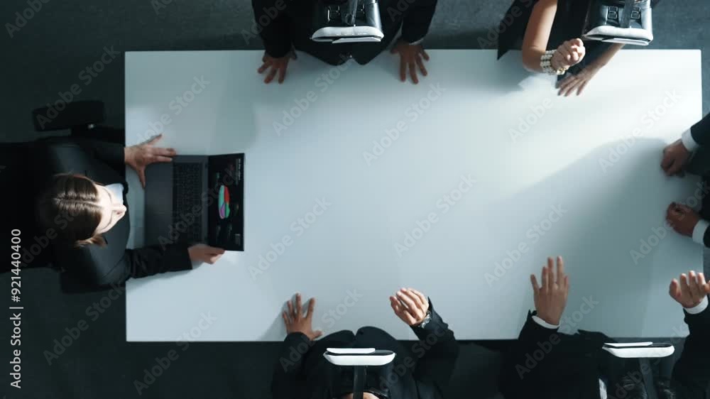 Poster top down aerial view of diverse data analysts wearing vr headset and stand around table while using 