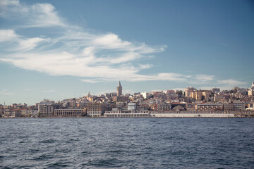Obraz premium View of Istanbul cityscape Galata Tower with floating tourist boats in Bosphorus ,Istanbul Turkey