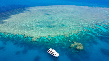Great Barrier Reef tourism boat Australia taken via Drone, beautiful view, blue