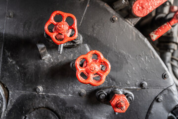 Valves and controls of a vintage steam locomotive