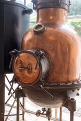 Fototapeta premium Copper distillation tanks, classic perfume production from natural ingredients in Provence, perfume factory in Grass or Eze, French riviera
