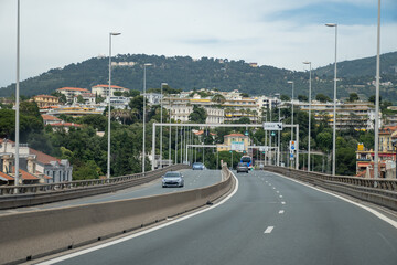 Driving car or camper on free on Cote d'azur, French Riviera in summer, road signs and directions, traffic jam on touristic road in France