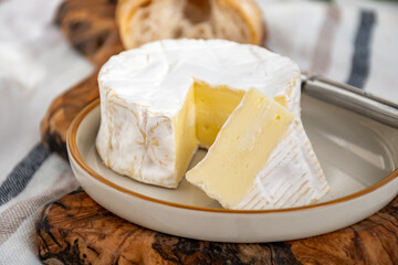 French soft Camembert cheese, original Camembert de Normandie made from raw cow milk