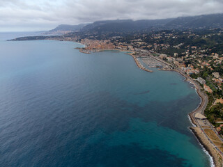 Naklejka premium Early morning view on French Riviera, colorful Menton old city and marina on blue Mediterranean Sea near French-Italian border, Monaco, Monte-Carlo, travel destination, panoramic view
