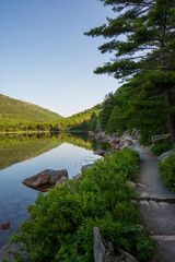 Fototapeta premium Serene Pathway Beside Jordan Pond, Acadia National Park