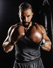 A man wearing boxing gloves