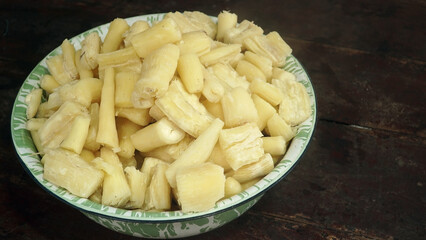 Singkong rebus or boiled cassava is a traditional Indonesian meal made from steamed cassava. Focus selected