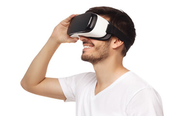 Handsome man experiencing virtual reality while using vr headset