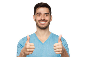 Young happy man showing thumbs up
