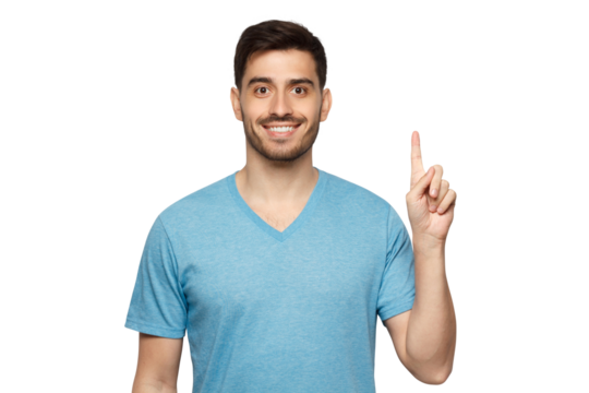 Portrait of excited young man looking at camera, pointing finger up
