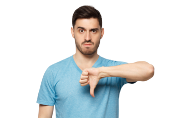 Young dissatisfied man showing thumb down or dislike