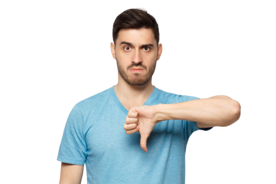 Young dissatisfied man showing thumb down or dislike