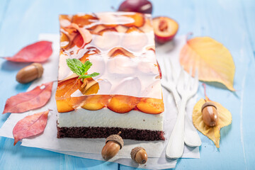 Homemade and delicious plum cake made of cream and fruits.