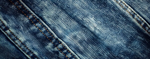 Close-up of Blue Denim Fabric with Orange Stitching