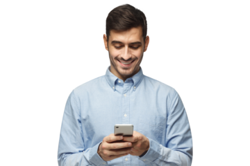 Young smiling business man in blue shirt reading sms, using smartphone, isolated on white background