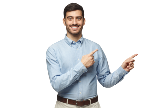 Smiling businessman pointing right with two hands and looking at camera
