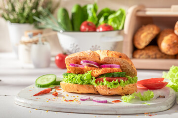 Homemade and healthy sandwich served with lemonade in the kitchen.