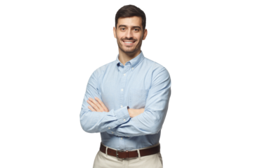 Handsome smiling businessman in blue shirt standing with arms crossed