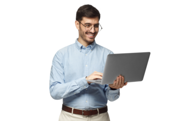 Portrait of businessman standing, holding laptop and watching media with happy smile, sharing web content