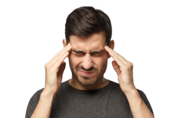Portrait of young man suffering from severe headache, pressing fingers to temples with closed eyes