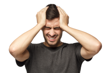 Headache concept. Young man squeezing head with hands. People, stress, tension and migraine concept