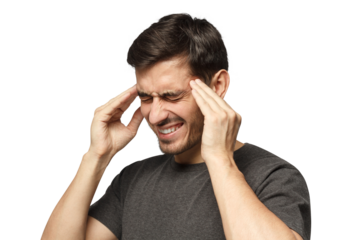 Close-up of young man in casual gray t-shirt, touching temples with fingers as if suffering from severe migraine