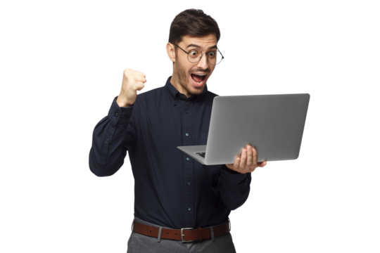 Excited business man looking at laptop screen with mouth wide open, celebrating his win