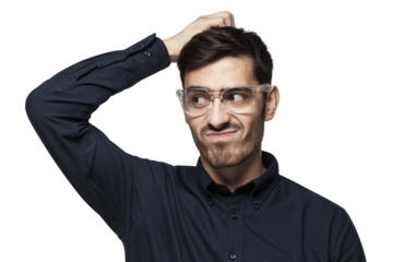 Young thoughtful businessman thinking, scratching his head trying to find solution