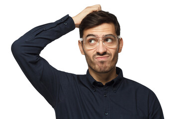 Young man wearing glasses scratching his head trying to find solution