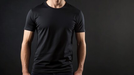 Naklejka premium Man in Black T-Shirt Against a Dark Background