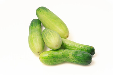 Fresh green Cucumber on isolated white background (mentimun hijau segar di latar belakang warna putih)