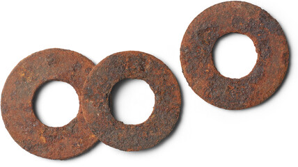 old corroded flat metal washers isolated white background, circular metallic discs with hole in center exposed to moisture or environmental condition 