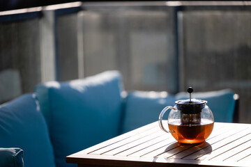 glass teapot with black tea