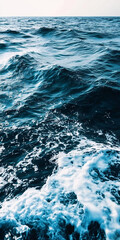 Obraz premium Deep blue ocean waves conveying calm and tranquility