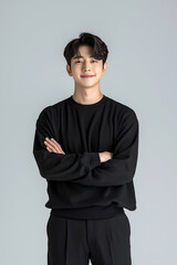 Obraz premium Casual Portrait of a Smiling Man in a Black Sweater