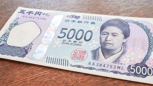 Very close up of the New Japanese 5000yen Banknote with Umeko Tsuda , Tokyo, Japan
