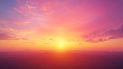 A Vivid Sunset Over Rolling Hills, Bathed in Warm Hues of Pink, Orange, and Yellow