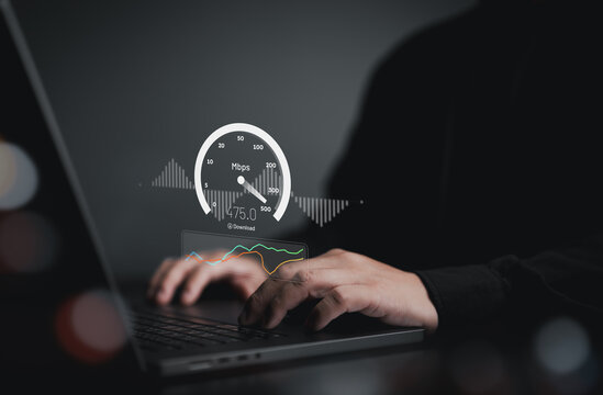 Fast internet speed test, bandwidth network connection. Man using laptop computer to check wireless networking or 5G cellular Mbps or Gbps speed quality. Wi-Fi 7 download or upload transfer rate.