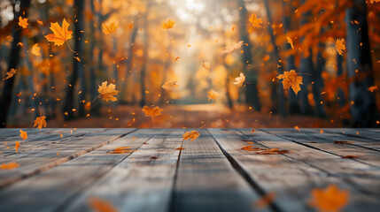 a wooden table top in the foreground. with vibrant orange and yellow leaves falling gently. Autumn