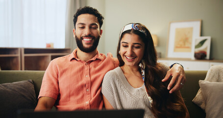 Smile, laptop and couple relax on couch in home together with romantic bonding, embrace and...