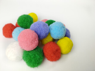 Colorful Pompoms isolated on white background, fluffy, lovely