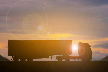 Silhouette truck long vehicle transportation sunset background