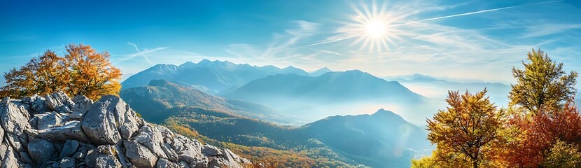 Fototapeta premium Majestic Mountain Range With Golden Autumn Trees and Sunbeams Shining Through.