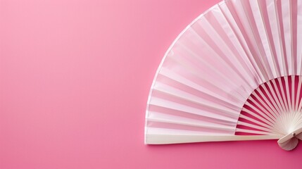White Fan on Pink Background
