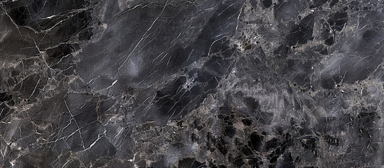 Deep charcoal marble texture with intricate veins of gray and black, designed to add a modern and sophisticated touch