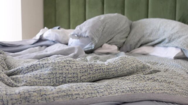messy bed in early morning , messy bed after waking up 
